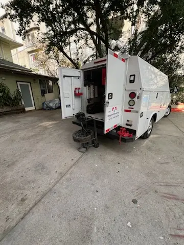 Magnet Plumbing service vehicle on-site for Grease Trap Cleaning in Silver Beach